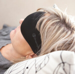 Woman wearing dreamlight sleep mask
